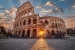 Rome,,Italy,At,The,Colosseum,Amphitheater,With,The,Sunrise,Through